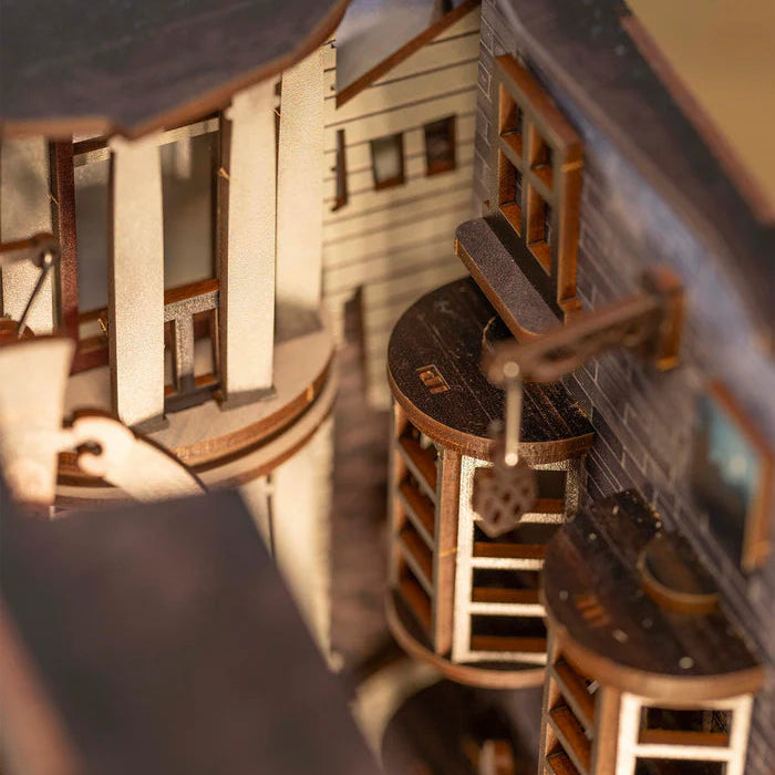 Close-up of a detailed model of a building with wooden textures and architectural elements.