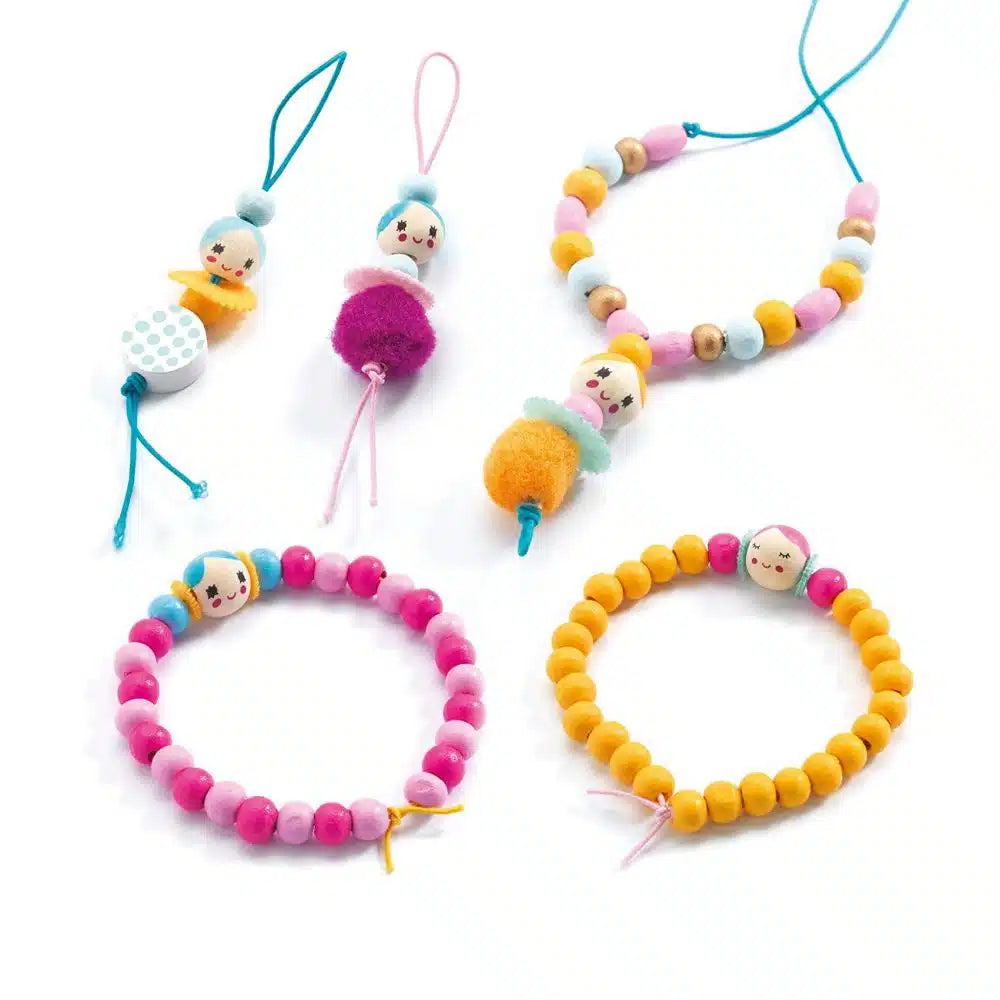 Colorful children's bracelets with character beads on a white background