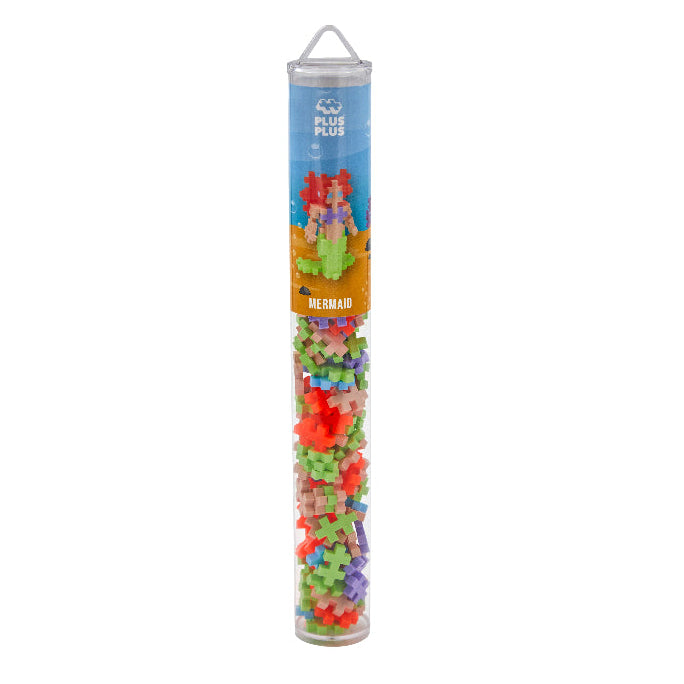Tube of colorful building blocks with a mermaid figure on a white background