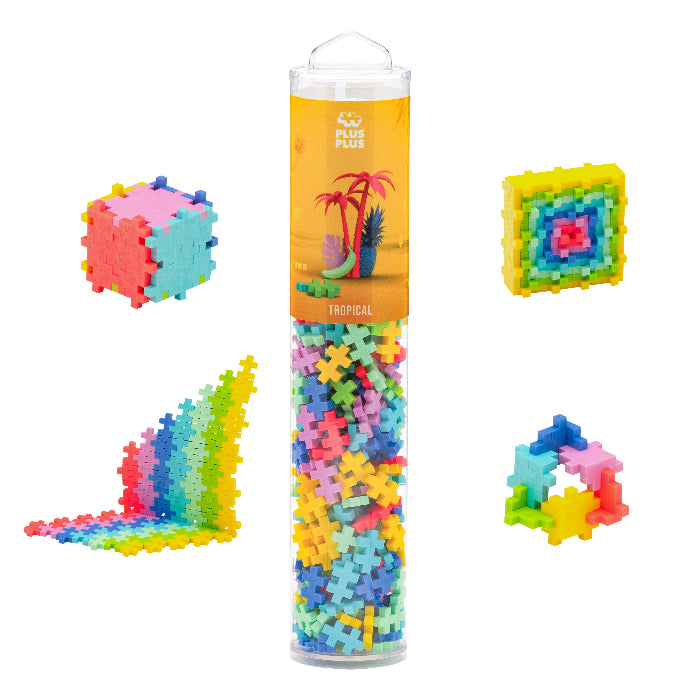 Colorful building block set in a cylindrical tube with 'Plus Plus' branding on a white background.