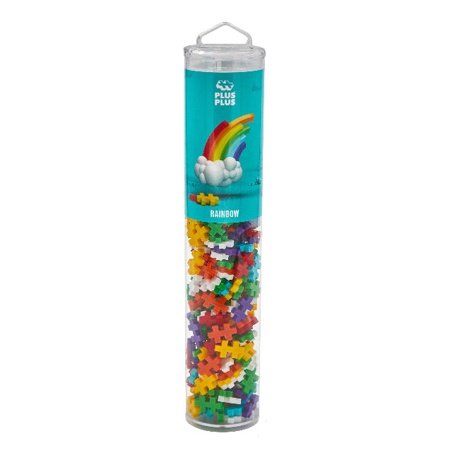 Tube of colorful building blocks with Plus Plus branding on a white background