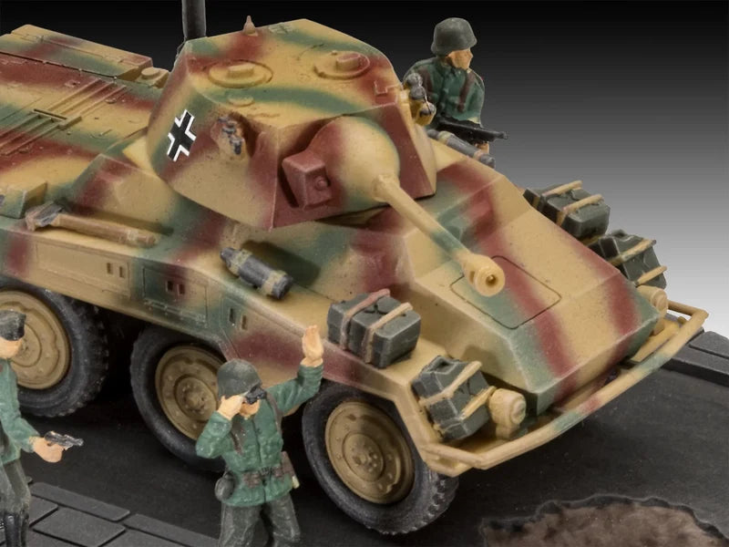 Model of a camouflage military vehicle with soldiers around on a dark background