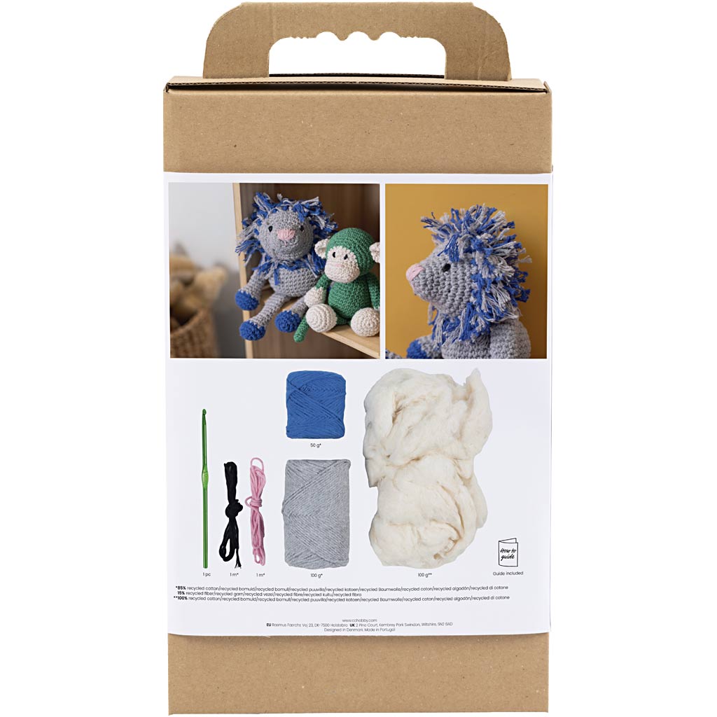 Knitting kit packaging with yarn and tools on a white background