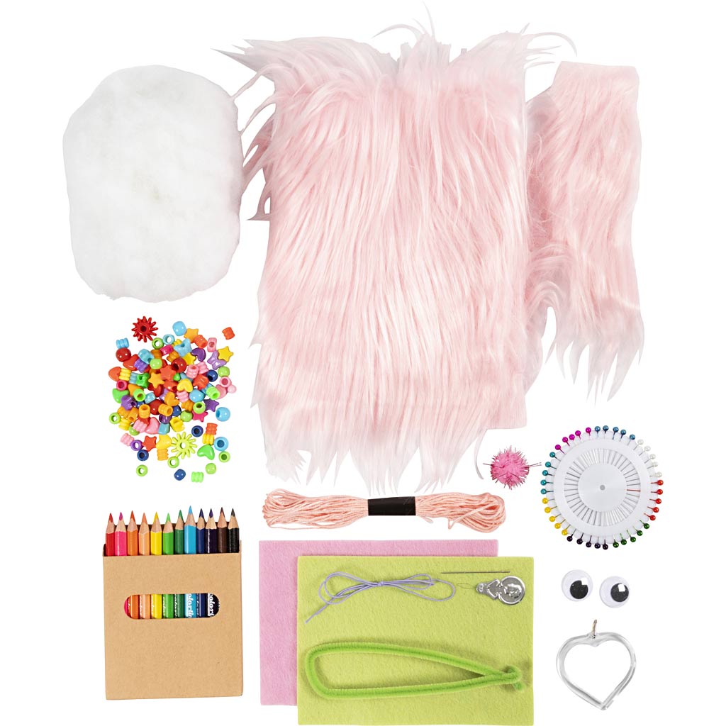 Collection of craft supplies including yarn, beads, and tools on a white background