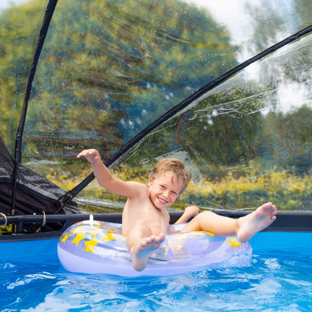 EXIT Brown Wood Round Frame Pool with Dome- 360 kid in the pool on a floatie