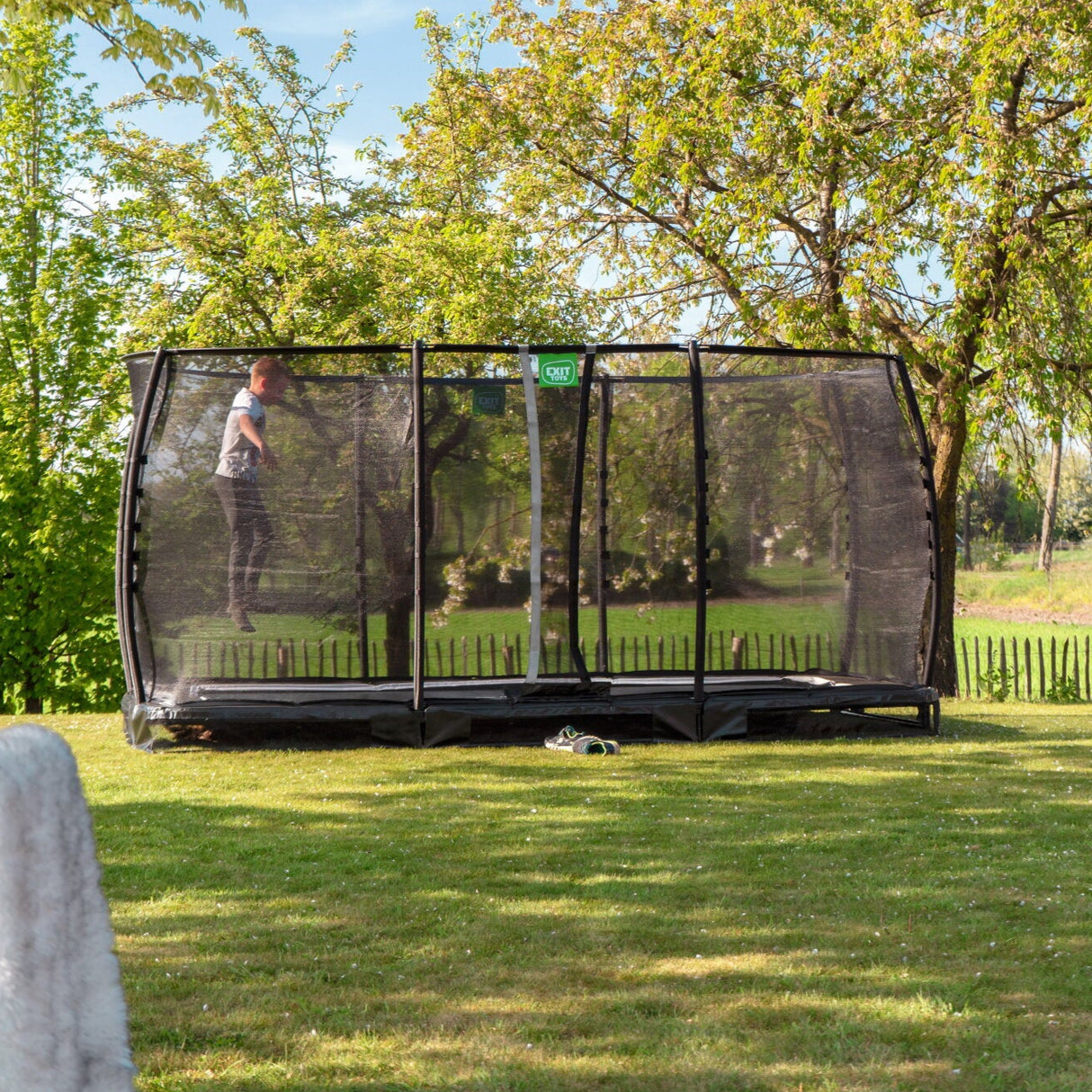 Exit Allure In-ground Trampoline in the garden