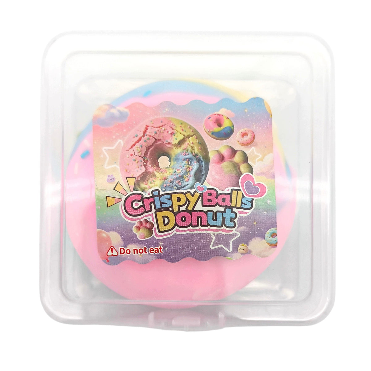 A round pink novelty donut-shaped item sealed in a clear plastic clamshell container with a colorful front label reading 'Crispy Balls Donut' and 'Do not eat.'.