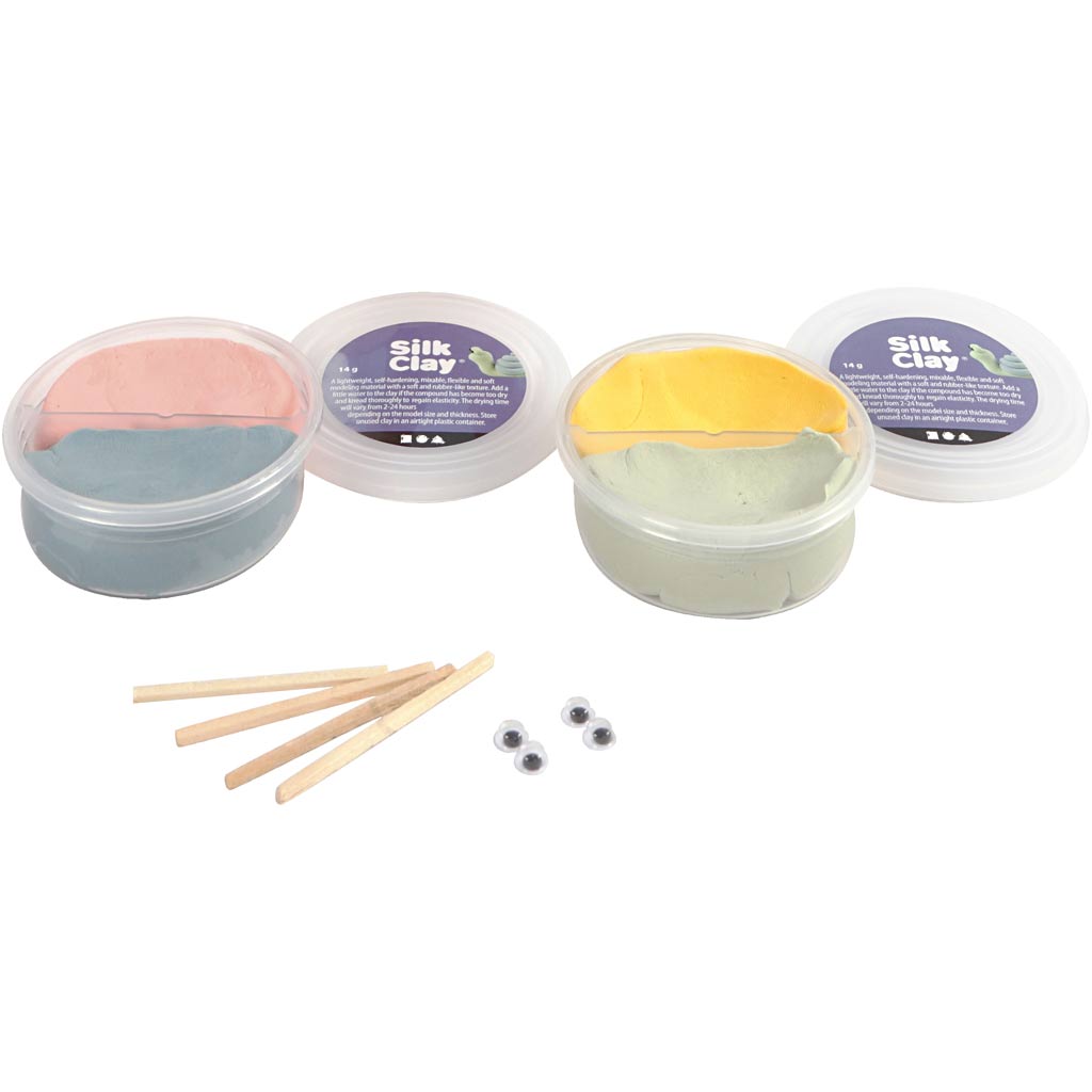 Silk Clay containers with colorful clay and tools on a white background