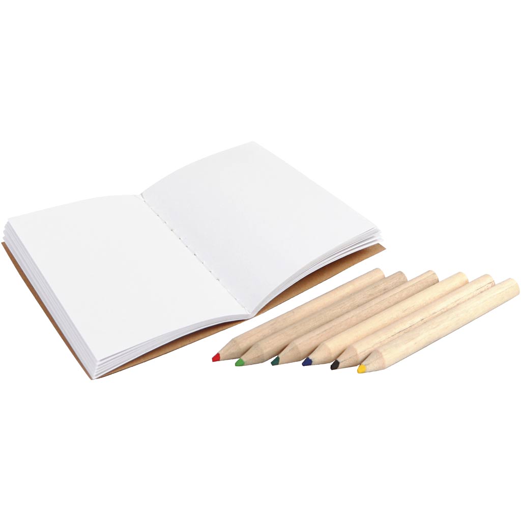Open notebook with colored pencils on a white background