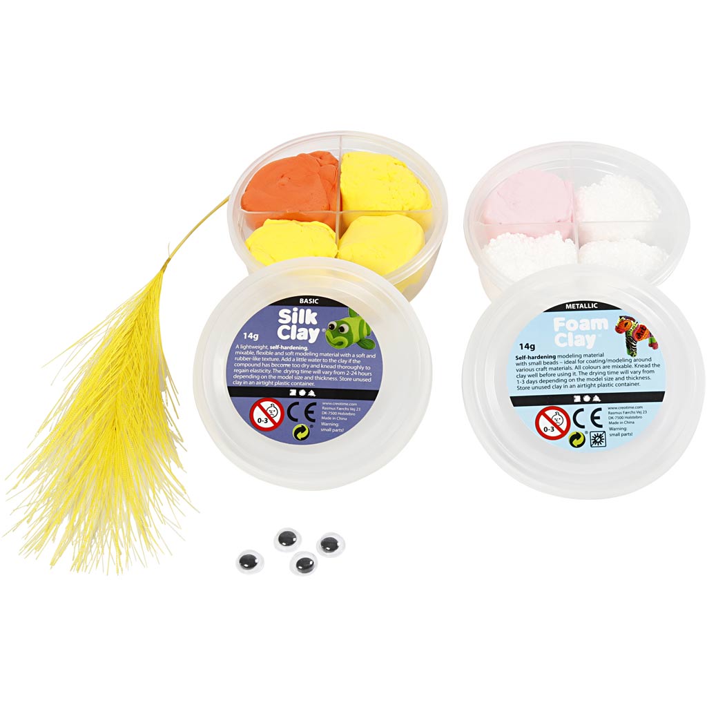 Three containers of different types of clay on a white background
