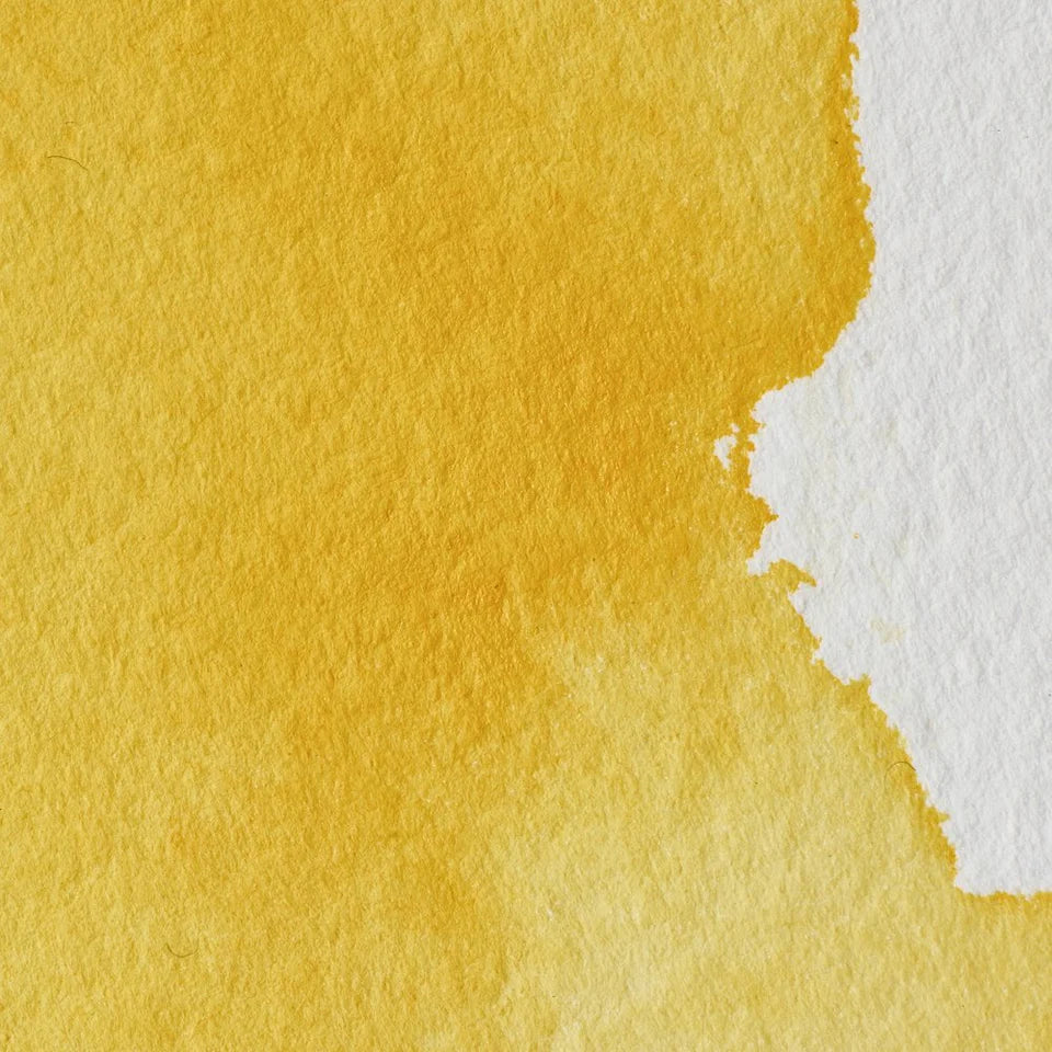 Yellow watercolor texture on white paper
