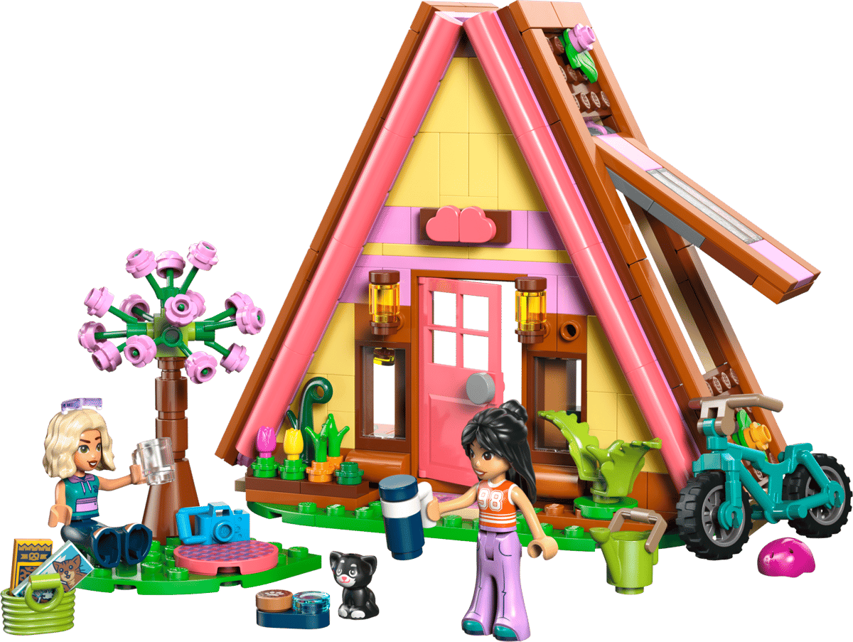 Toy house with two dolls, a cat, and various accessories on a transparent background