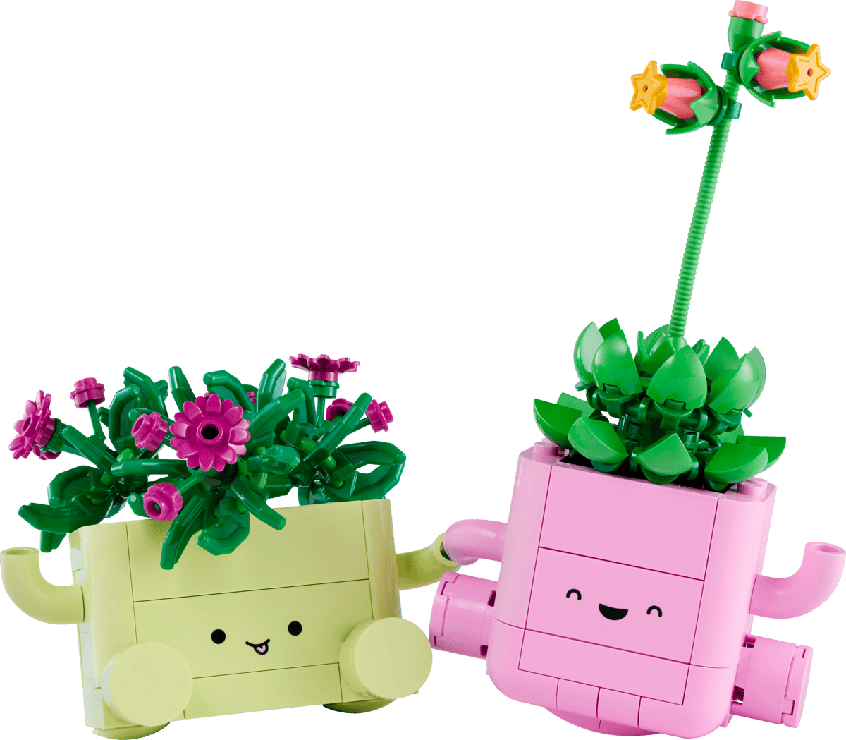 Two toy planters made from interlocking bricks, one yellow and one pink, with smiling faces on a transparent background.