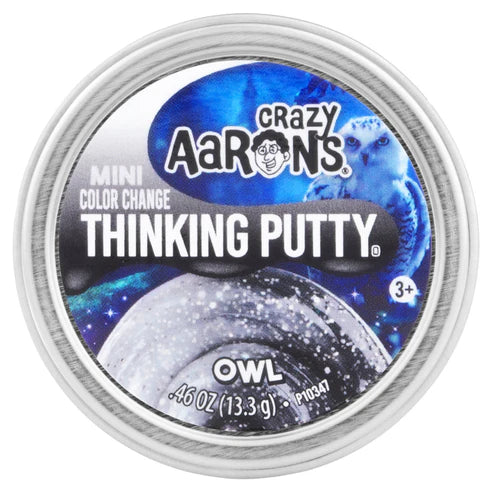 A round tin of Crazy Aaron's Mini Color Change Thinking Putty in the color 'Owl', featuring a blue and black space-themed label with an owl graphic.