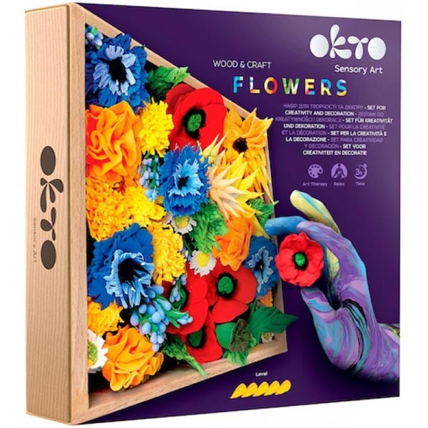 Oko Sensory Art 'Flowers' wooden craft kit in its original packaging, featuring a purple box with a colorful illustration of 3D paper flowers and a hand holding a red paper flower.