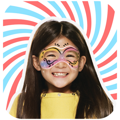 A girl smiling with her face painted in a colourful Face Mask with the Snazaroo Pro Palette
