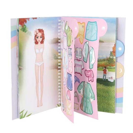 Children's activity book with a dress-up doll and clothes on a white background