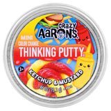 Crazy Aaron's Thinking Putty container with ketchup and mustard design on a white background