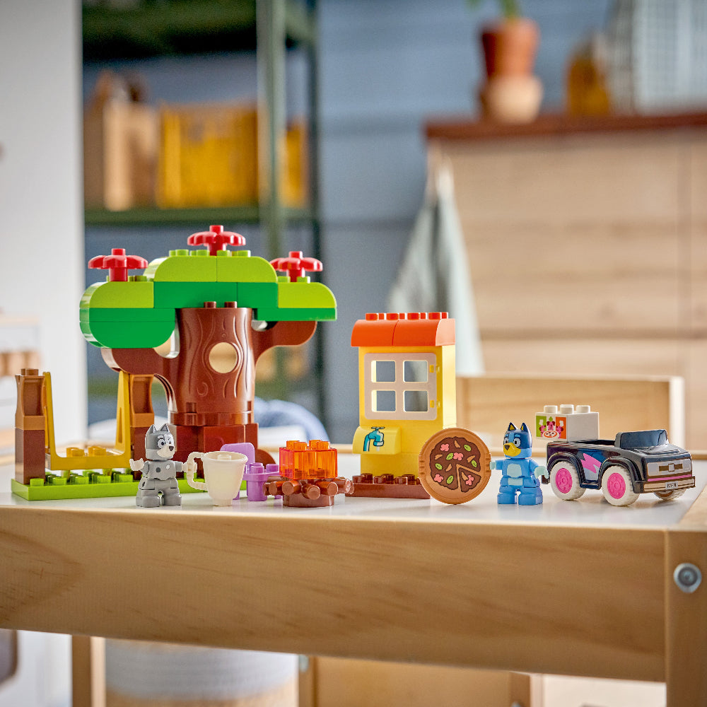 Toy set with colorful building blocks on a wooden surface