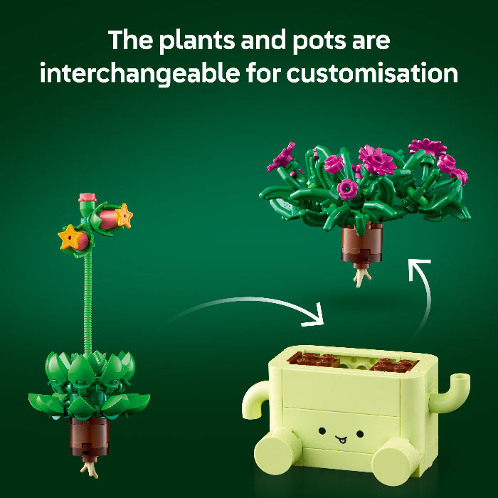 Toy set with interchangeable plants and pots on a green background