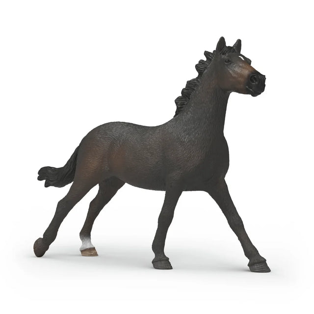 Dark brown horse figurine on a white background