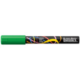 Green paint marker with colorful design on a white background