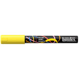 Yellow paint marker with Liquitex branding on a white background