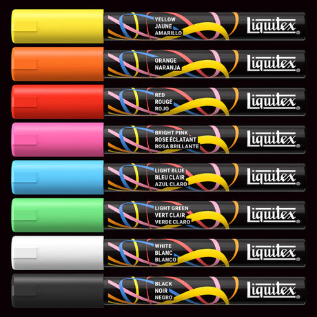 Set of Liquitex paint markers in various colors on a black background