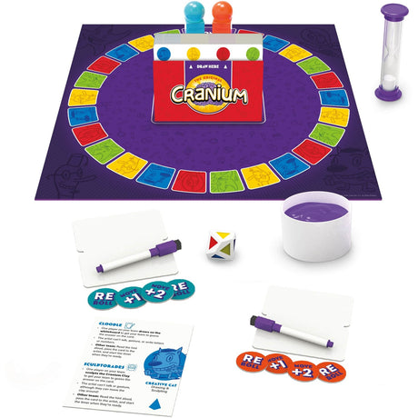 Cranium board game set with colorful tiles, markers, and a timer on a white background
