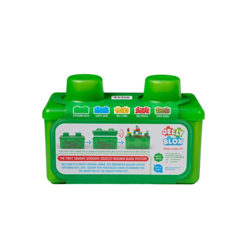 Green toy block packaging with colorful labels on a white background