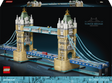 LEGO Architecture Tower Bridge building set box art showing the assembled model bridge with tan towers, blue suspension cables and roadway, a small red bus, and the LEGO logo on a dark background.