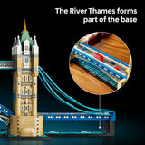 A toy model of Tower Bridge built from interlocking blocks, shown on a black background with white text reading 'The River Thames forms part of the base' and a circular inset showing a train on the bridge tracks.