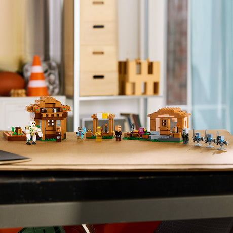 LEGO mini village set on a wooden table with blurred background