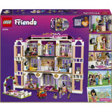 LEGO Friends dollhouse set packaging with multiple rooms and characters displayed.