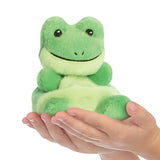 Green plush frog toy held in hands against a white background