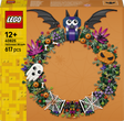 LEGO 40825 Halloween Wreath box front, showing a decorated wreath with a purple bat, white ghost, orange jack-o'-lantern, spiderwebs, and colorful flowers on an orange background with a yellow LEGO logo panel on the left.