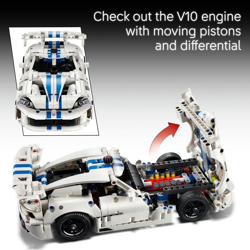 A white and blue LEGO Technic sports car model shown on a black-to-gray gradient background, with a smaller inset front view and a larger open-side view highlighting the engine and differential. White text at the top reads, 'Check out the V10 engine with moving pistons and differential.