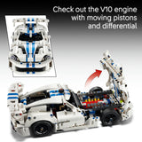 A white and blue LEGO Technic sports car model shown on a black-to-gray gradient background, with a smaller inset front view and a larger open-side view highlighting the engine and differential. White text at the top reads, 'Check out the V10 engine with moving pistons and differential.