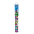 Tub of colorful fairy toys with a blue label on a white background
