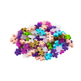 Colorful pixelated cross-shaped objects on a white background