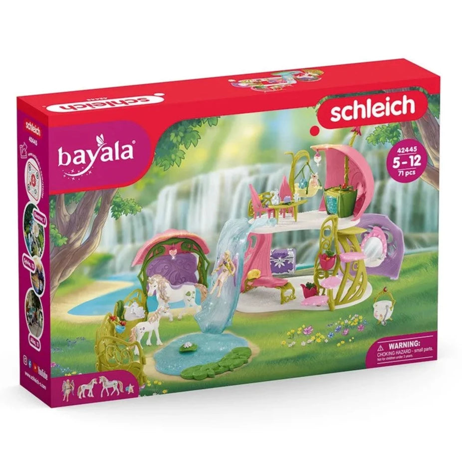 Glittering flower house with unicorns, lake and stable