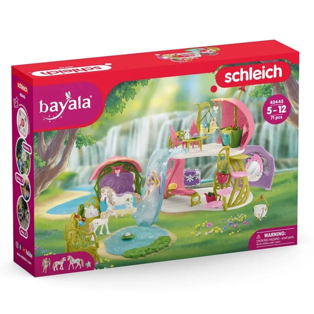 Glittering flower house with unicorns, lake and stable