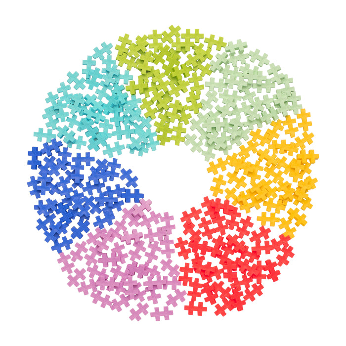 Colorful puzzle pieces arranged in a circular pattern on a white background