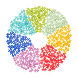 Colorful puzzle pieces arranged in a circular pattern on a white background