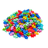 Colorful cross-shaped building blocks on a white background
