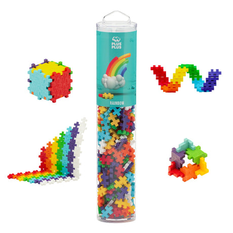 Colorful building block set with a cylindrical tube labeled 'Plus-Plus' on a white background.
