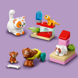 LEGO pets and accessories on a purple background