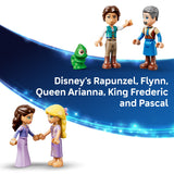 Toy figures of Disney characters including Rapunzel, Flynn, Queen Arianna, King Frederic, and Pascal on a blue background.