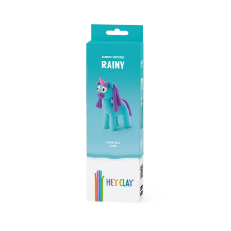Packaged toy unicorn with 'Hey Clay' branding on a white background
