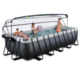 Family swimming in an Exit Toys black leather framed pool
